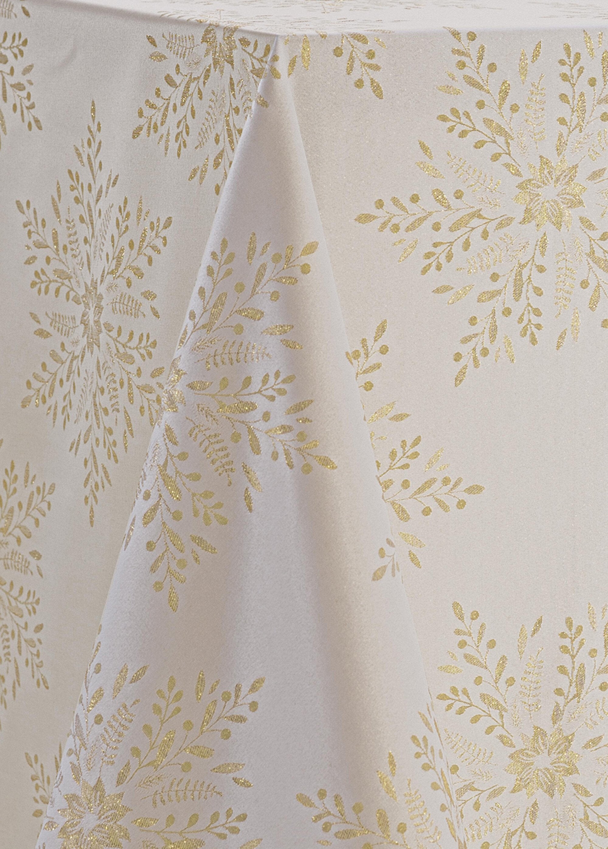Mantel_navideño_con_estampado_de_copos_de_nieve_metálicos_marfil_y_amarillo_DE1_slim