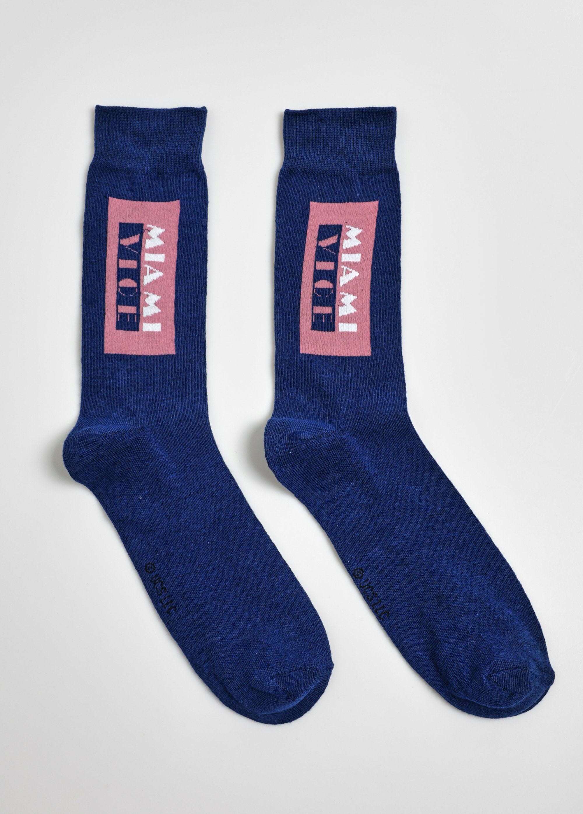 Par_de_calcetines_con_licencia_de_Miami_Vice_azul_y_rosa_FA1_slim