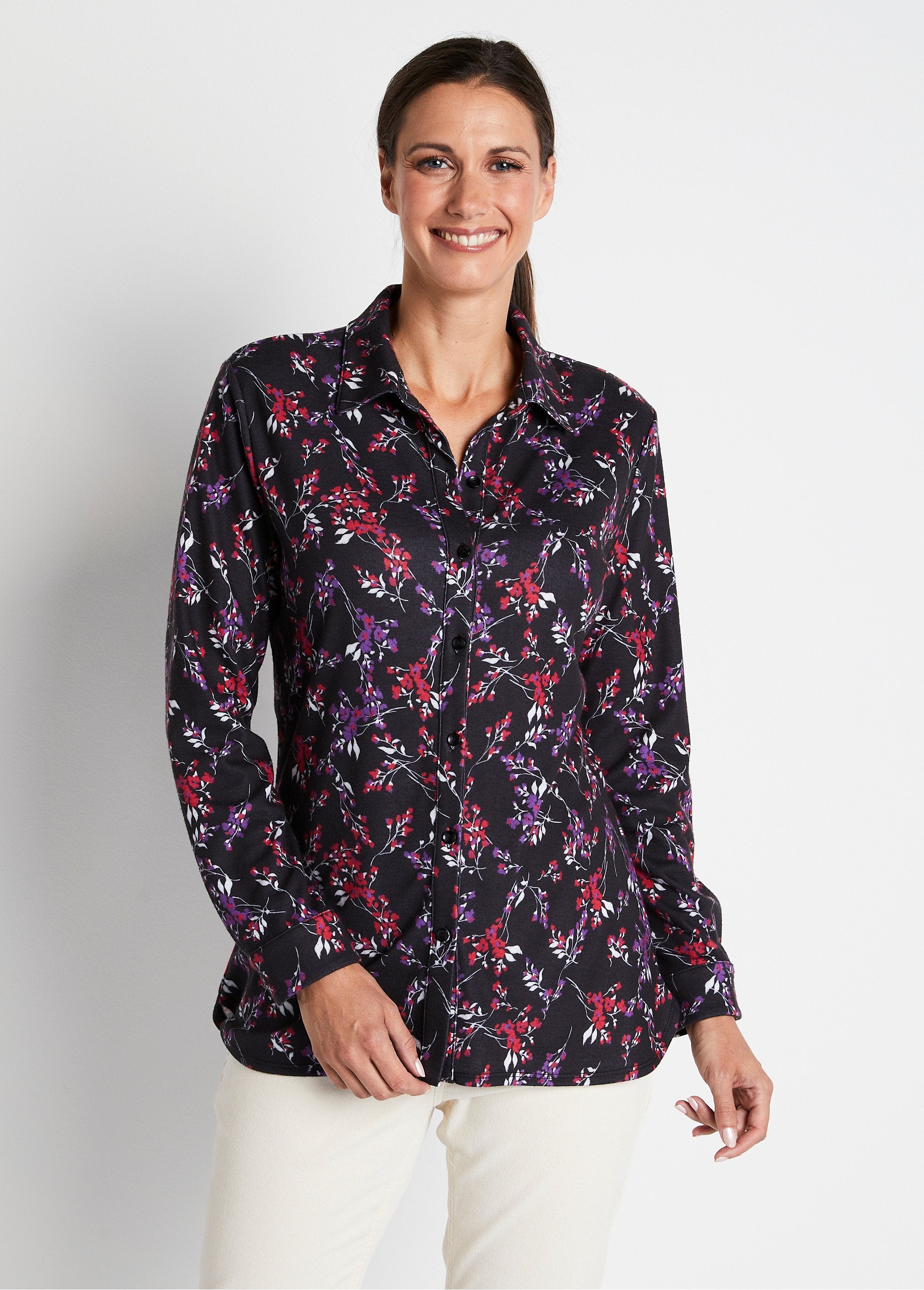 Blusa_de_punto_cálida_con_flores_Estampado_negro_FA1_slim