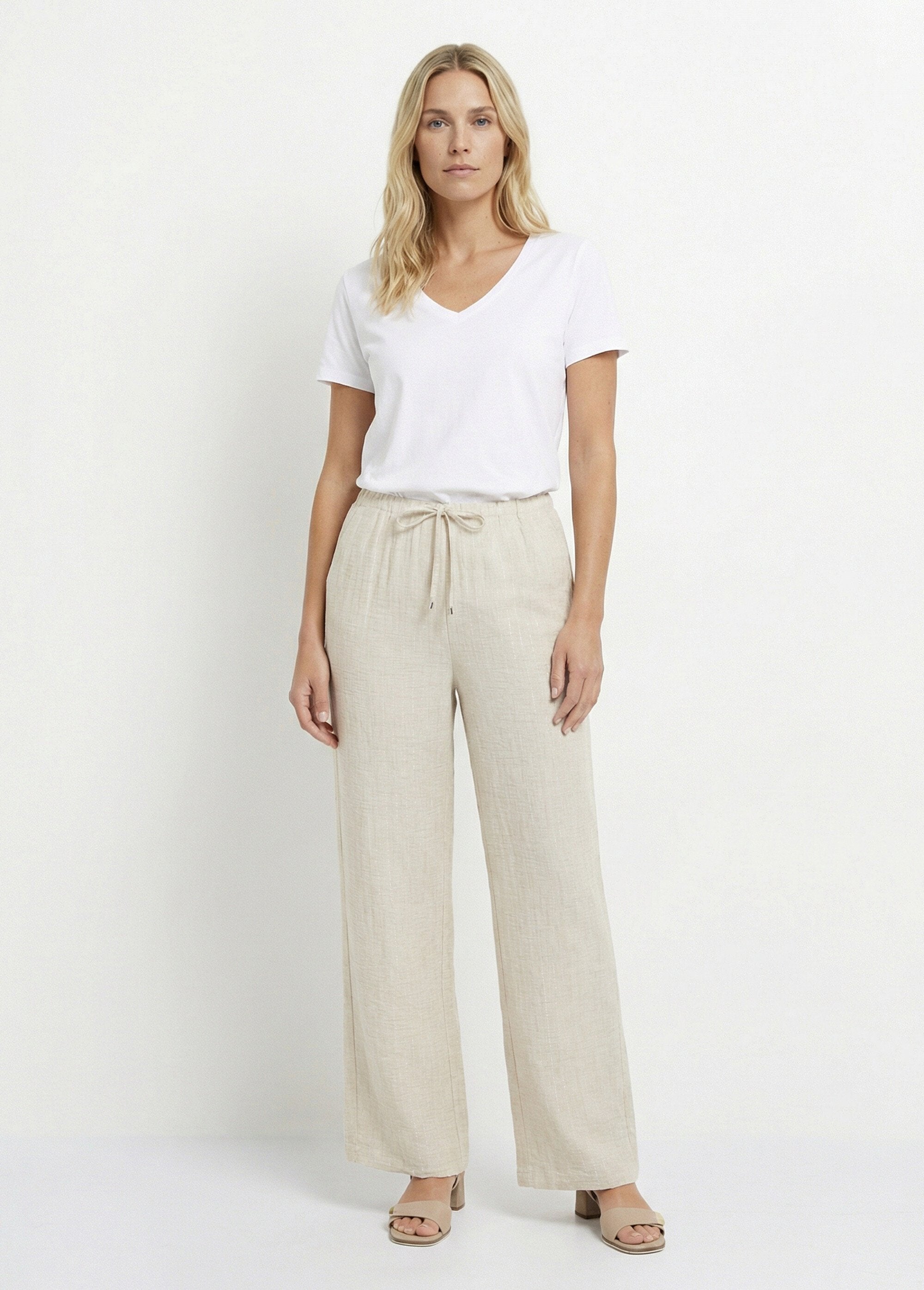 Pantalones_de_vestir_a_rayas_con_apariencia_irregular_Beige_SF1_slim